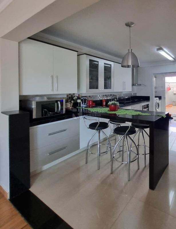 Casa em condomínio à venda no bairro Jardim do Lago: COZINHA