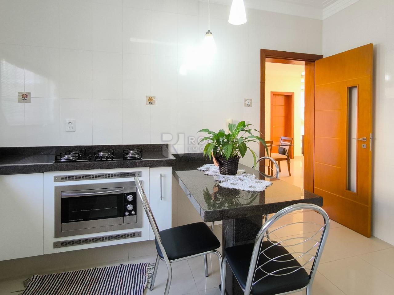 Casa em condomínio à venda no bairro Jardim Terras de Santa Elisa: COZINHA