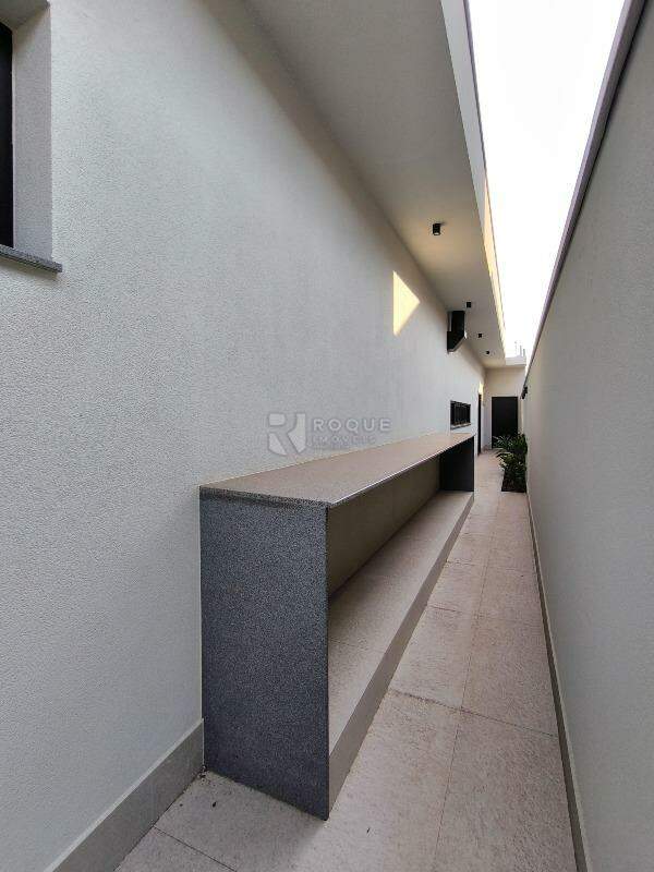 Casa em condomínio à venda no bairro Residencial Ilha de Bali: LATERAL EXTERNA