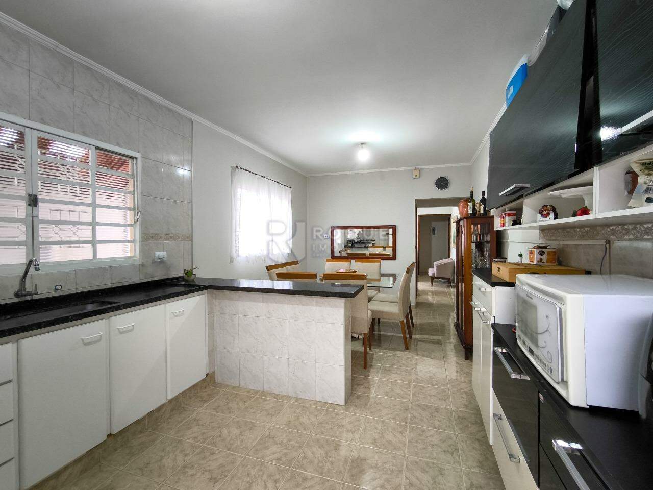 Casa com salão à venda no bairro Jardim Alvorada: COZINHA