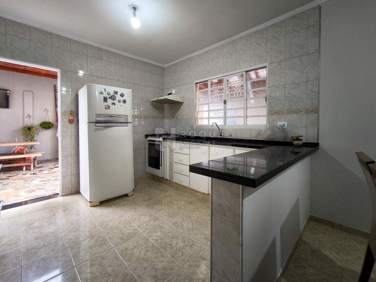 Casa com salão à venda no bairro Jardim Alvorada: COZINHA