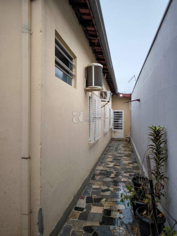 Casa com salão à venda no bairro Jardim Alvorada: LATERAL EXTERNA