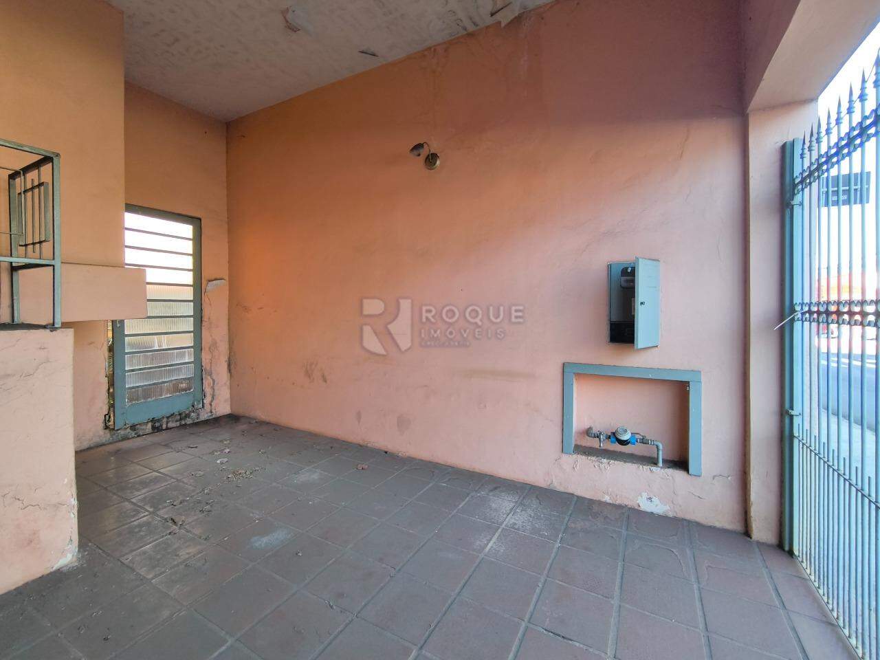 Casa com salão à venda no bairro Centro: GARAGEM
