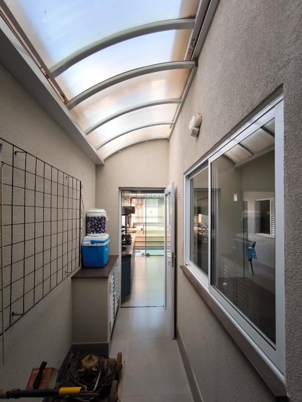 Casa em condomínio à venda no bairro Parque Residencial Roland: ÁREA DE SERVIÇO