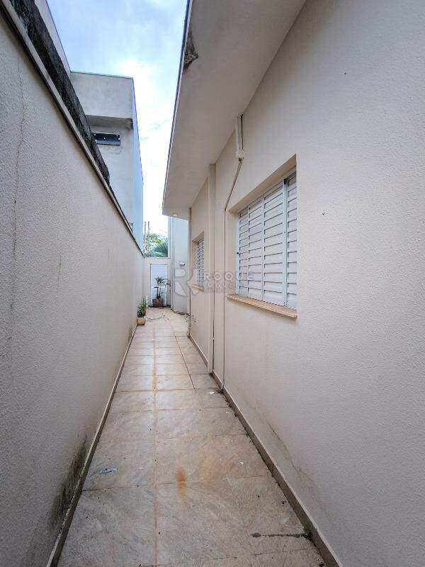 Casa em condomínio à venda no bairro Vale das Oliveiras: LATERAL EXTERNA