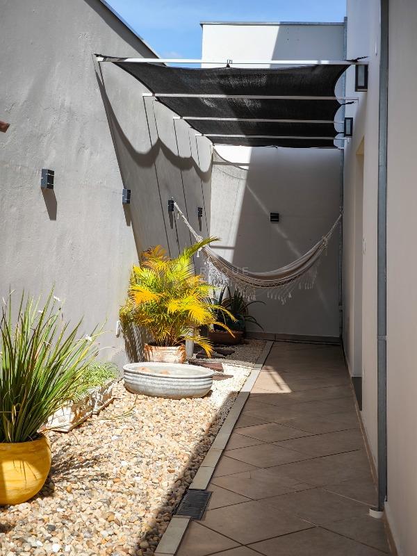 Casa em condomínio à venda no bairro Jardim Terras de Santa Elisa: LATERAL EXTERNA