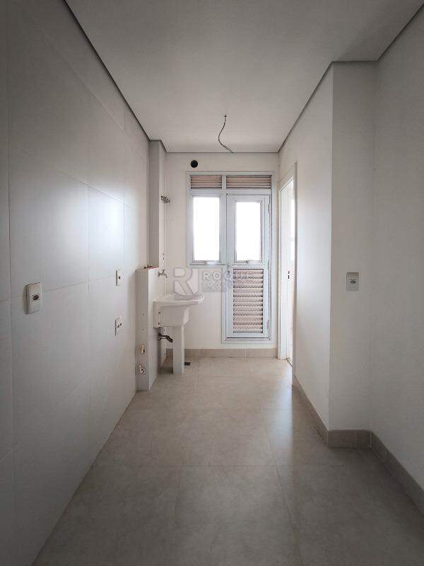 Apartamento à venda no bairro Jardim Aquárius: ÁREA DE SERVIÇO