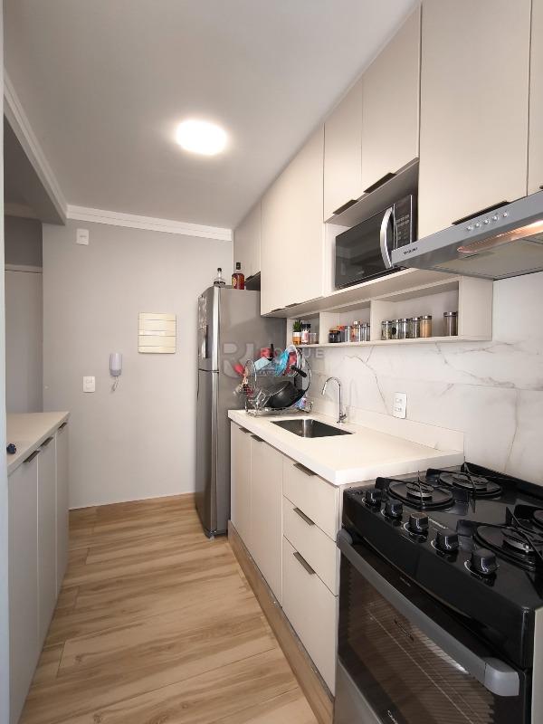 Apartamento à venda no bairro Vale das Esmeraldas: COZINHA