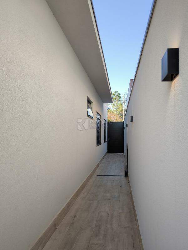 Casa em condomínio à venda no bairro Residencial Ilha de Bali: LATERAL EXTERNA