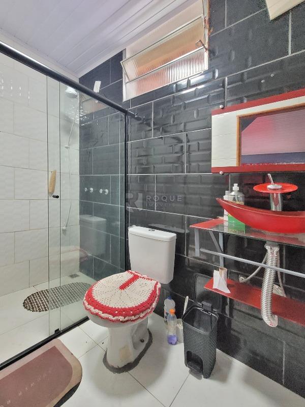 Casa em condomínio à venda no bairro Recanto dos Laranjais: BANHEIRO SOCIAL