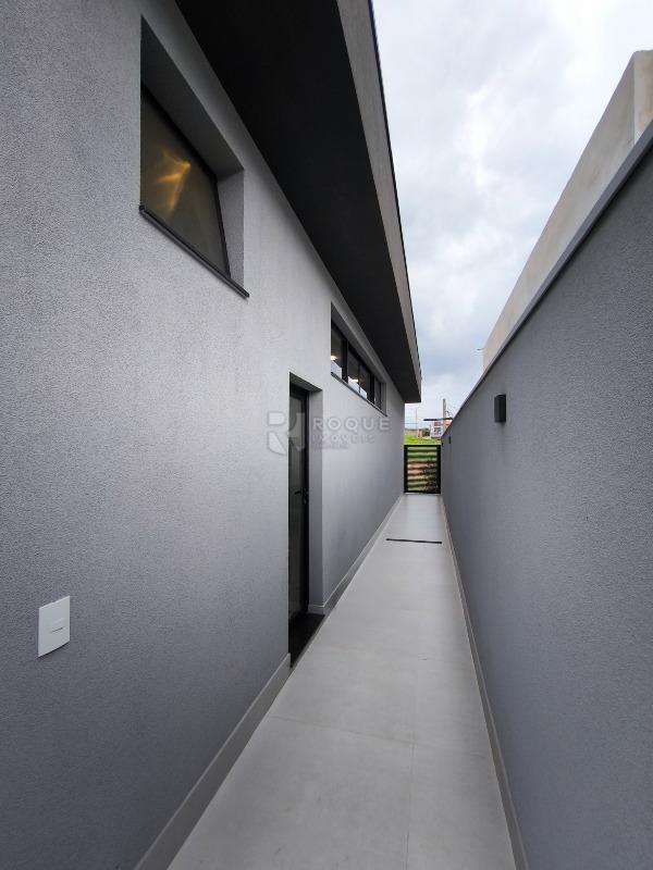 Casa em condomínio à venda no bairro Residencial Florisa: LATERAL EXTERNA