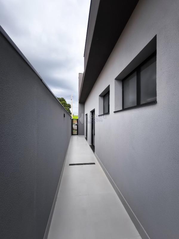 Casa em condomínio à venda no bairro Residencial Florisa: LATERAL EXTERNA