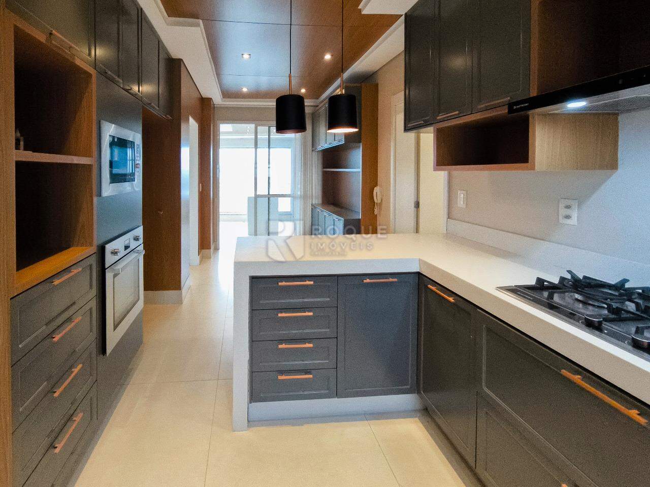 Apartamento à venda no bairro Jardim Aquárius: COZINHA