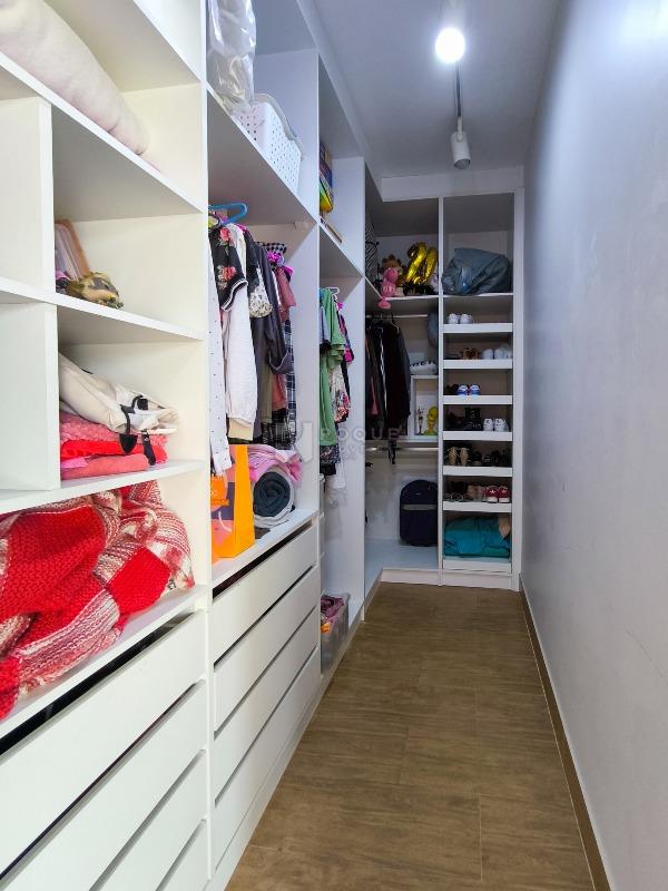 Casa em condomínio à venda no bairro Jardim Terras de Santa Elisa: CLOSET SUÍTE 1