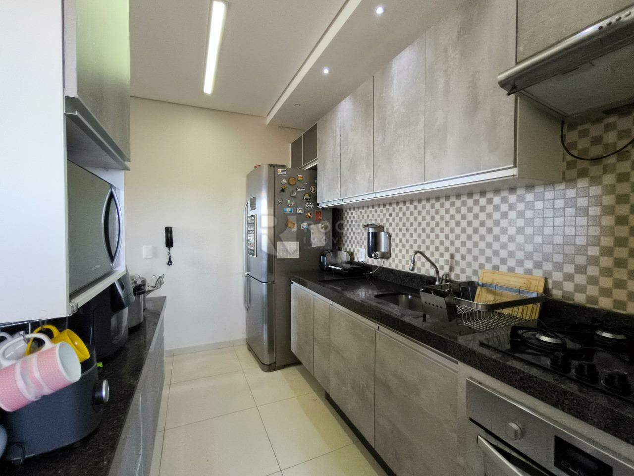 Apartamento à venda no bairro Desmembramento Oscar Antonio Breda: COZINHA