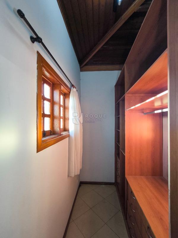 Casa em condomínio à venda no bairro Jardim Terras de Santa Elisa: CLOSET SUÍTE 1