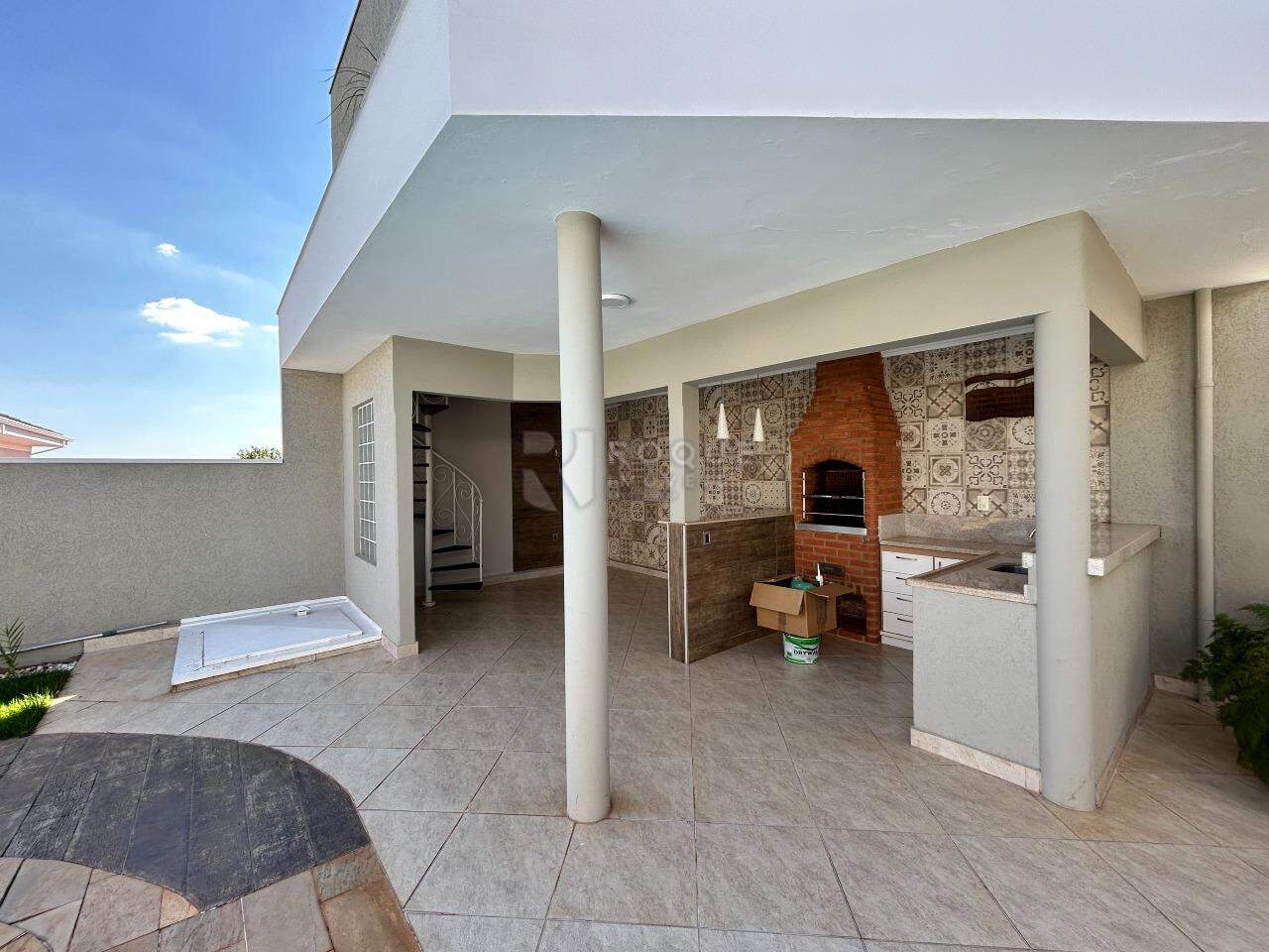 Casa em condomínio para aluguel no bairro Jardim Terras de Santa Elisa: Churrasqueira fundo 