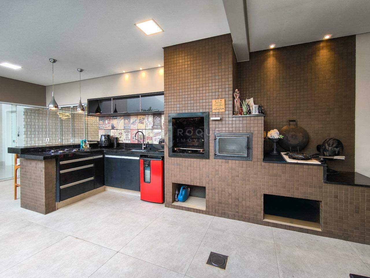 Casa em condomínio à venda no bairro Parque Residencial Roland: CHURRASQUEIRA