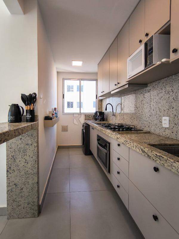 Apartamento à venda no bairro Vale das Esmeraldas: COZINHA