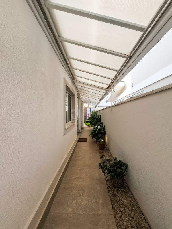 Casa em condomínio à venda no bairro Jardim Montezuma: LATERAL EXTERNA