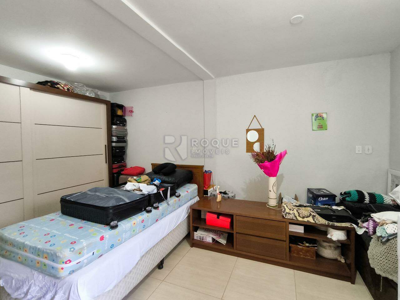 Casa em condomínio à venda no bairro Jardim Terras de Santa Elisa: DORMITÓRIO 2