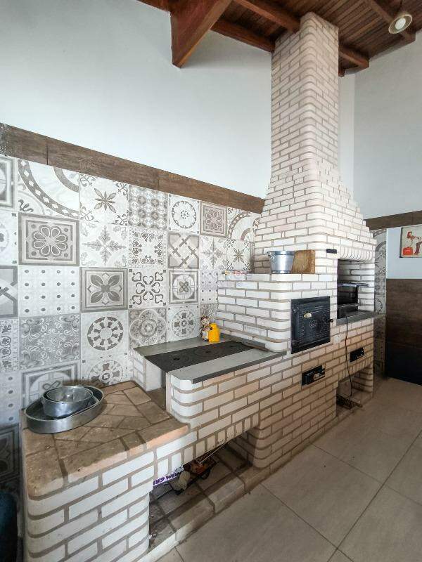 Casa em condomínio à venda no bairro Jardim Terras de Santa Elisa: CHURRASQUEIRA