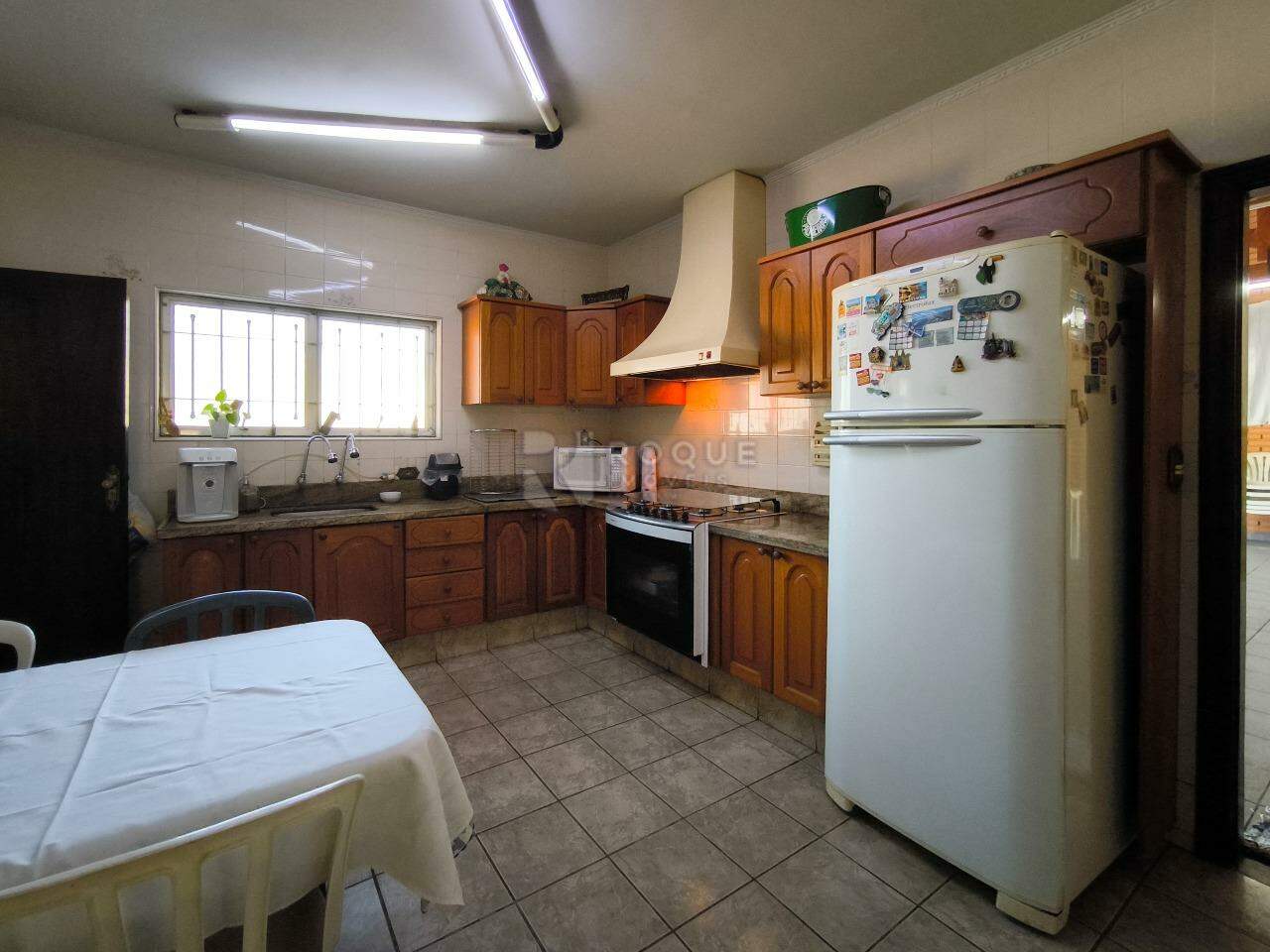 Casa em condomínio à venda no bairro Portal das Rosas: COZINHA
