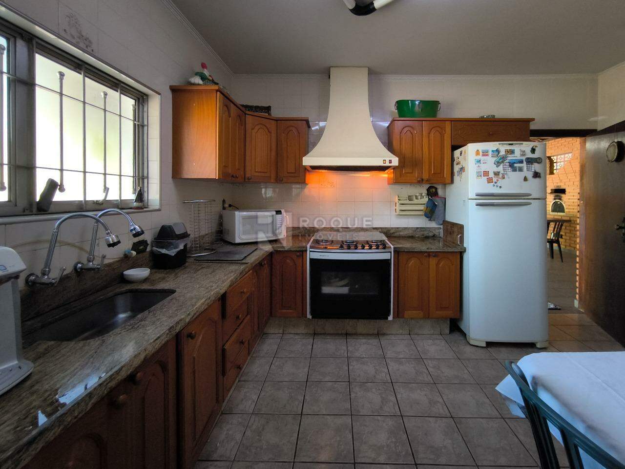 Casa em condomínio à venda no bairro Portal das Rosas: COZINHA