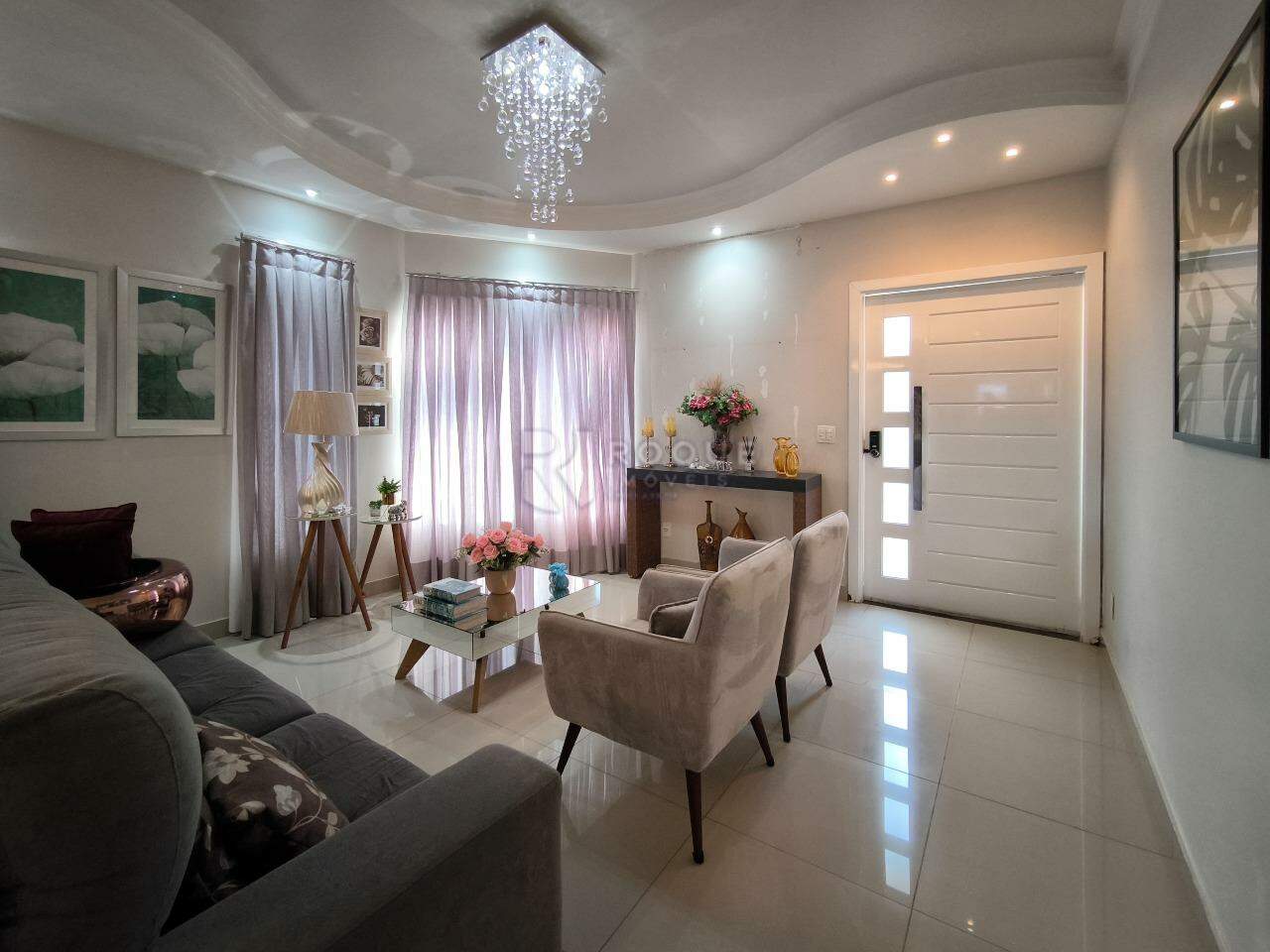 Casa em condomínio à venda no bairro Residencial Jardim dos Ipês: SALA DE ESTAR