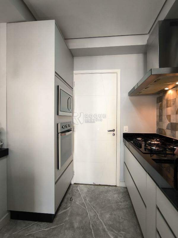 Apartamento à venda no bairro Jardim Aquárius: COZINHA