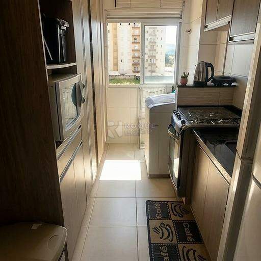Apartamento à venda no bairro Chácaras Antonieta: COZINHA