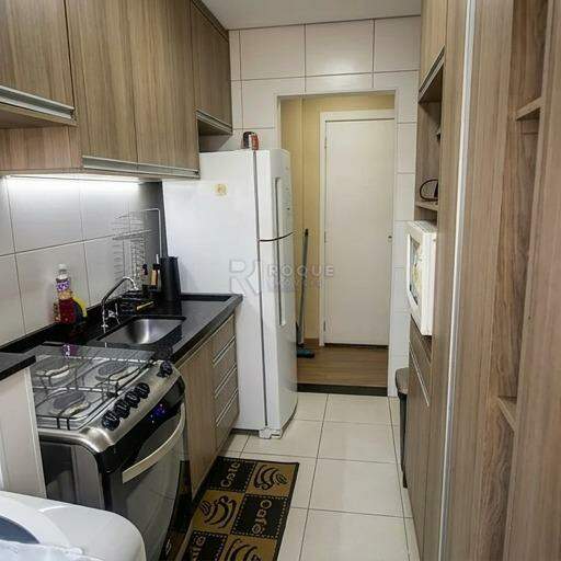 Apartamento à venda no bairro Chácaras Antonieta: COZINHA