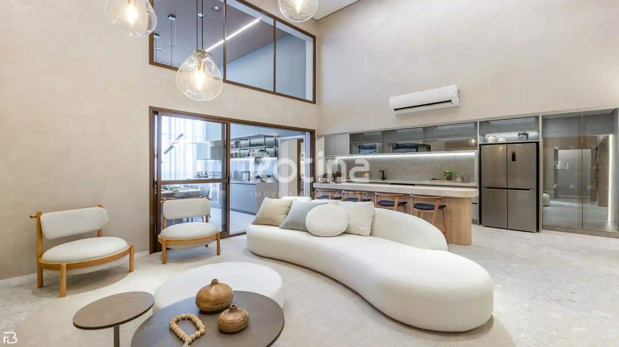 Apartamento à venda, 3 até 3 quartos em Uberlândia no bairro Morada da Colina no valor de R$ R$ 1.902.017,00 até R$ 5.216.035,00 - Rotina Imobiliária: Sala de estar e cozinha