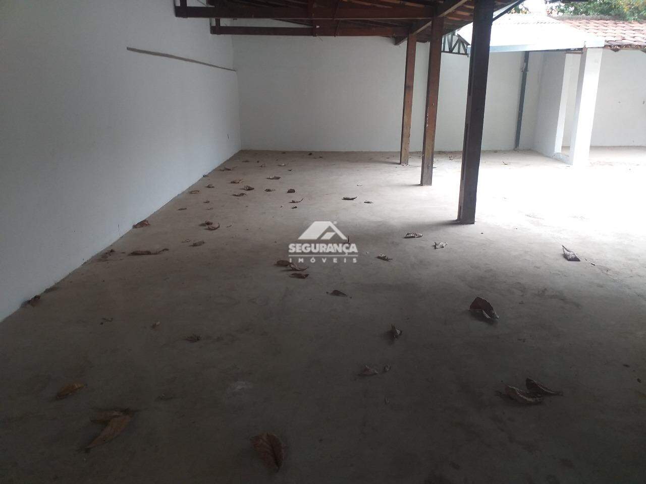 Casa para aluguel no Centro: GARAGEM