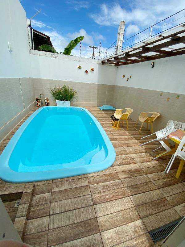 Condomínio residencial com 03 casas MOBILIADAS no Bairro Aruana com piscina - Foto 19