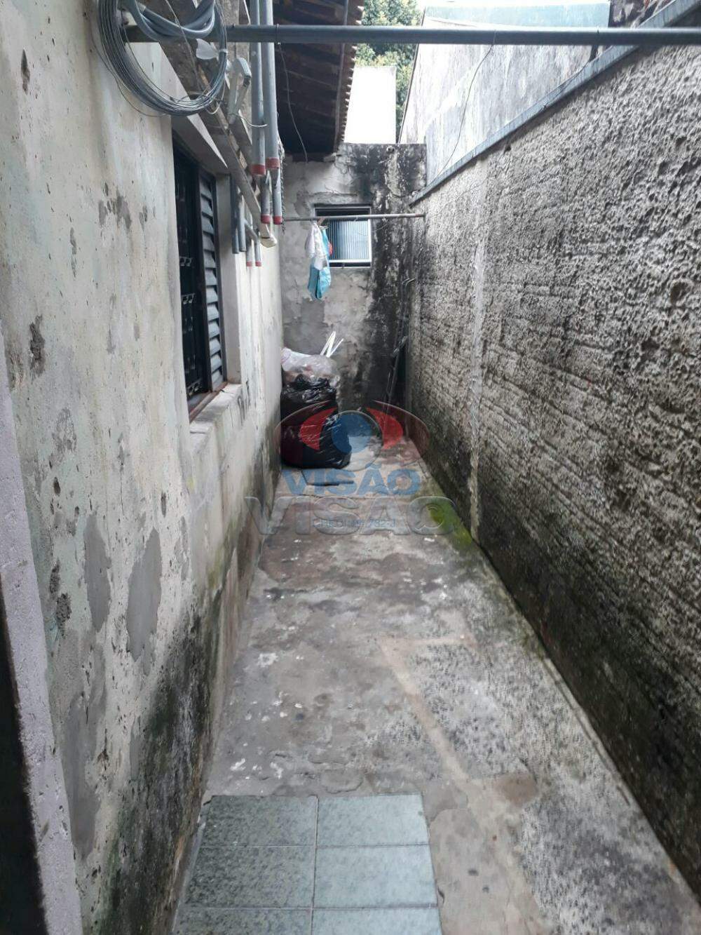 Casa à venda no Jardim Morada do Sol: Corredor externo