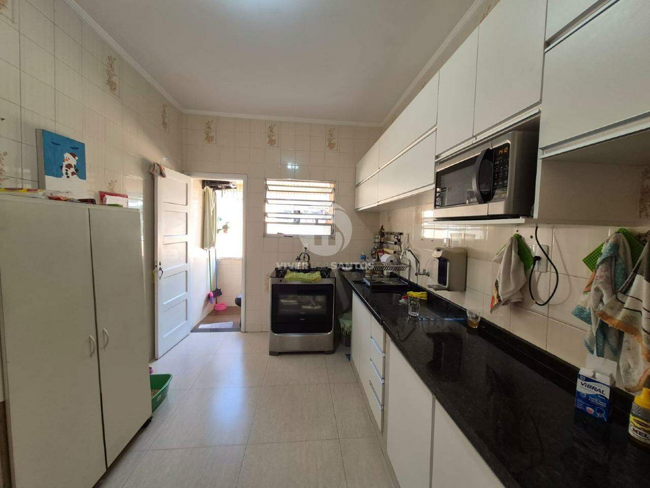 EXCELENTE CASA SOBREPOSTA ALTA NO BAIRRO DO MACUCO - CONFORTO E PRATICIDADE! em Macuco, Santos — foto 20