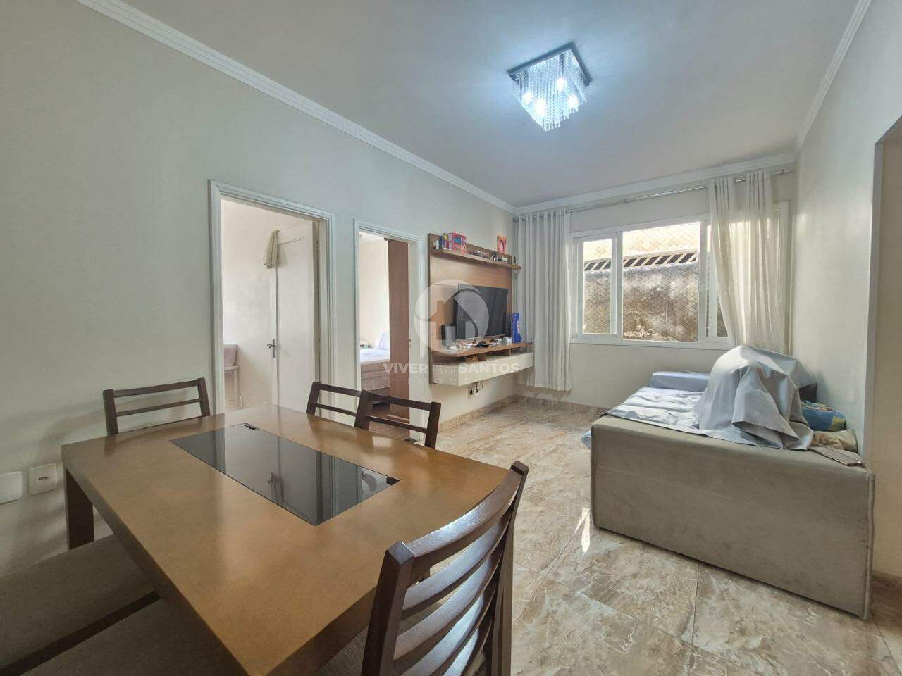 EXCELENTE CASA SOBREPOSTA ALTA NO BAIRRO DO MACUCO - CONFORTO E PRATICIDADE! em Macuco, Santos — foto 2