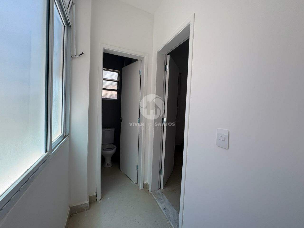 Oportunidade: Apartamento Reformado com 2 Suítes Próximo à Praia em Boqueirão, Santos — foto 12