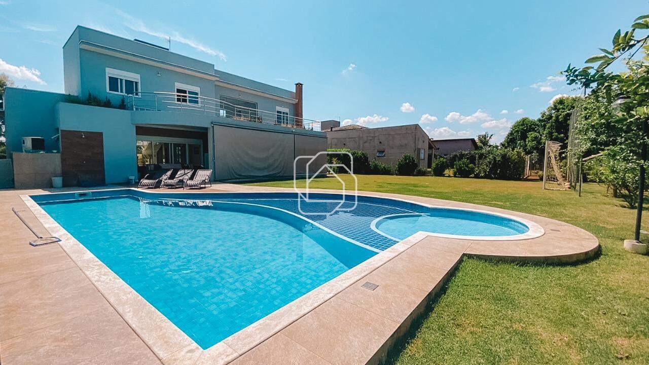 Casa de Condomínio à venda em Salto - SP - Residencial Primavera: Visão geral da área da piscina