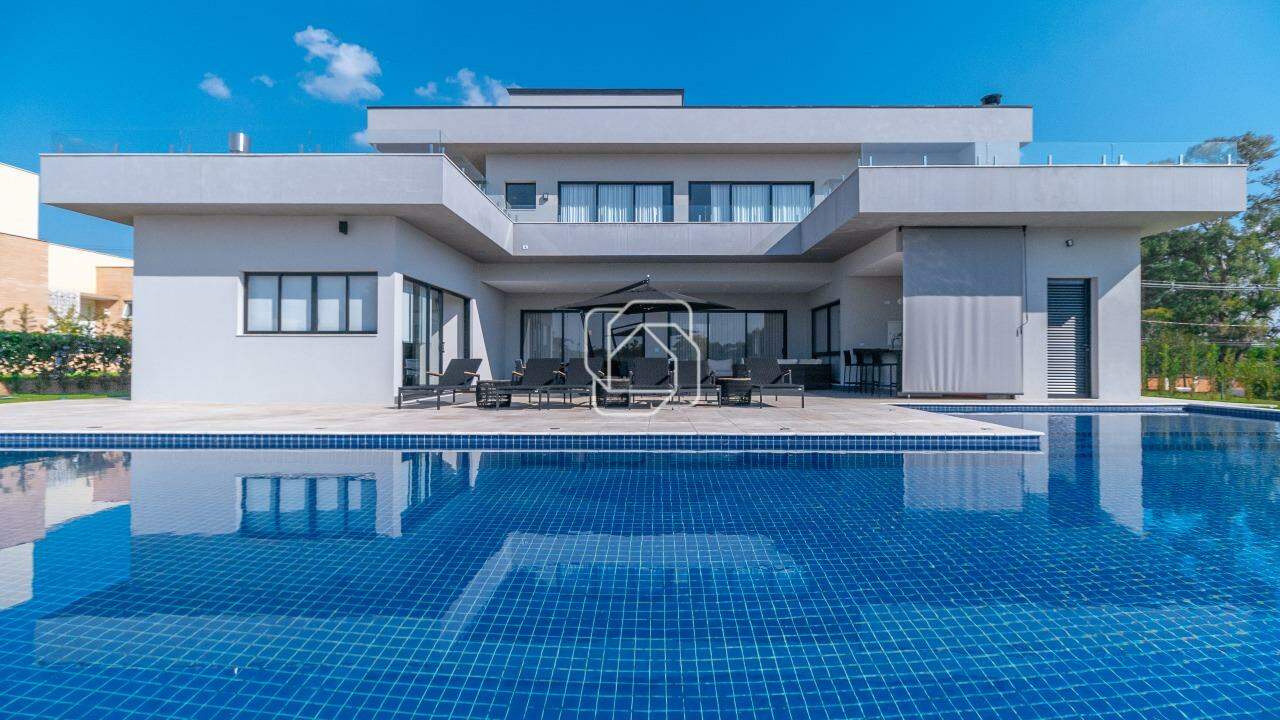 Casa de Condomínio à venda em Salto - SP - Haras Paineiras: Piscina e fachada