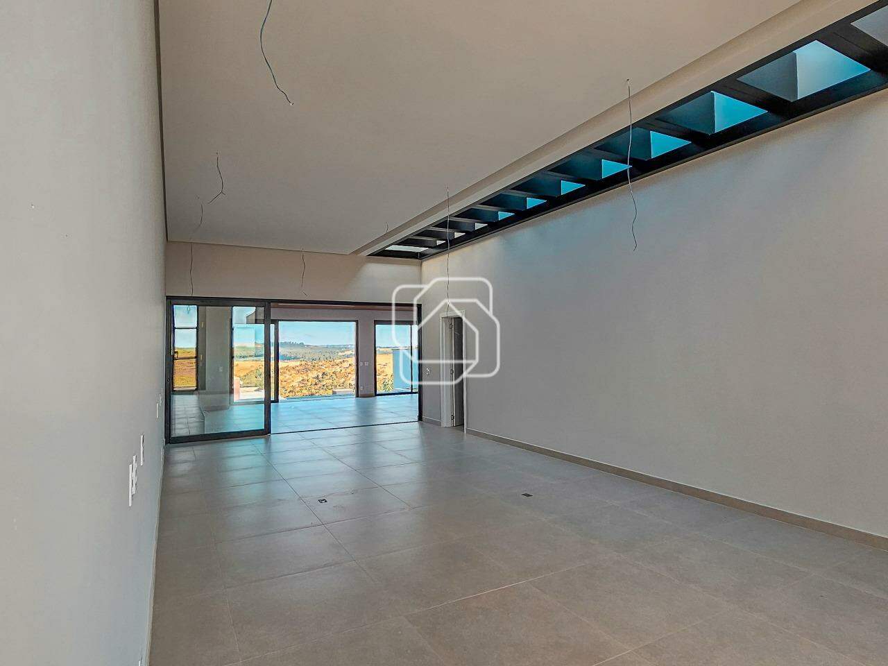 Casa de Condomínio à venda em Itu - SP - Residencial Parque Campos de Santo Antônio II: Sala de estar