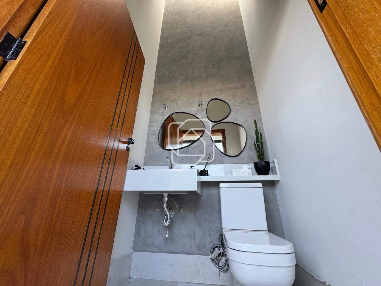 Casa de Condomínio à venda em Salto - SP - Portal dos Bandeirantes Salto: Lavabo
