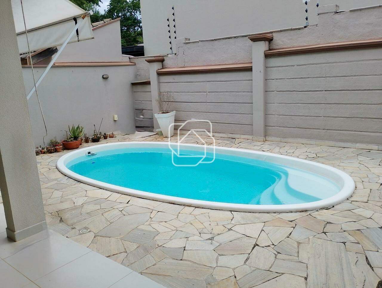 Casa de Condomínio à venda em Indaiatuba - SP - Jardim Portal dos Ipês: Área da piscina 
