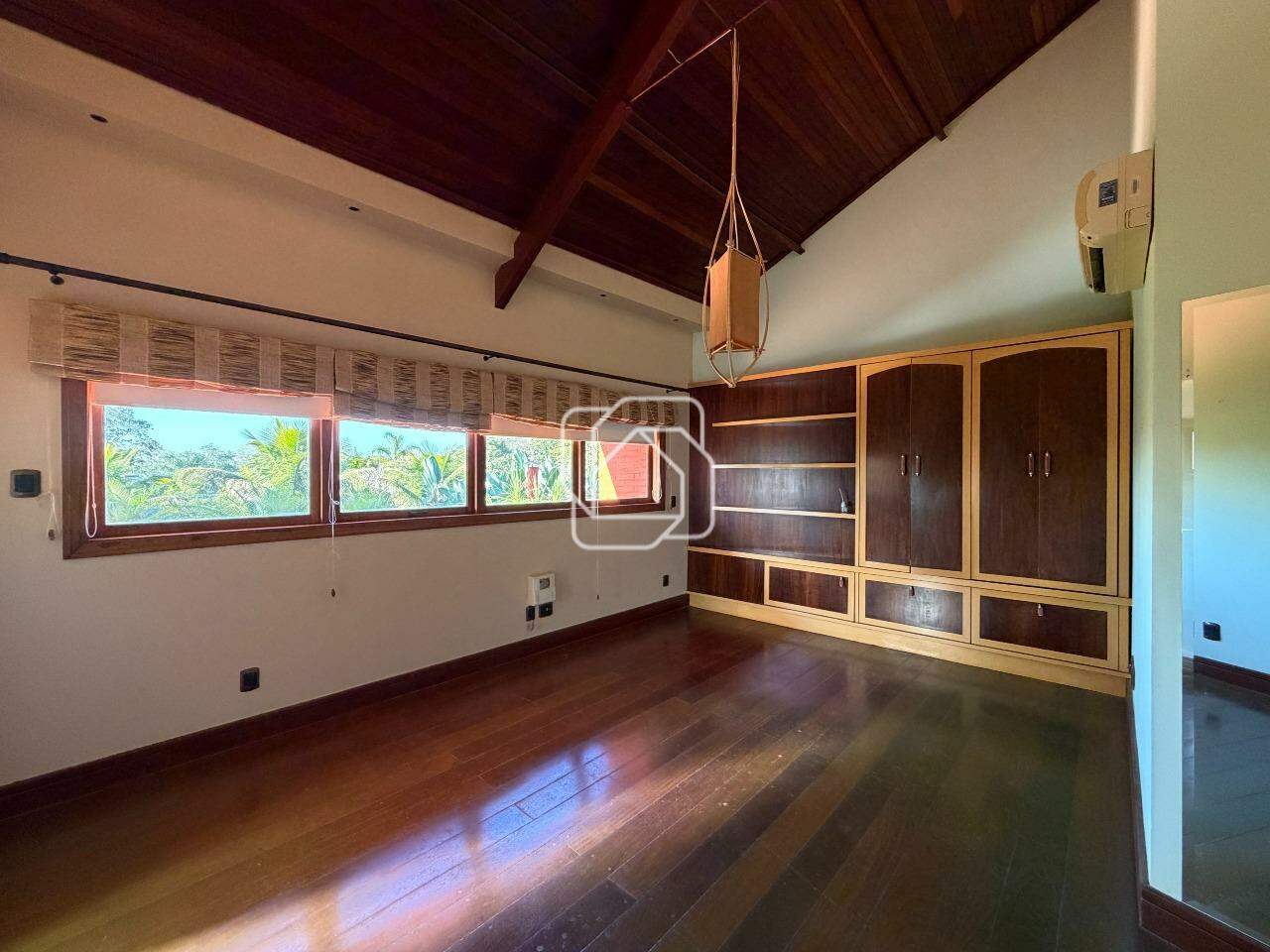 Casa de Condomínio à venda em Indaiatuba - SP - Helvetia Polo Country: Sala íntima