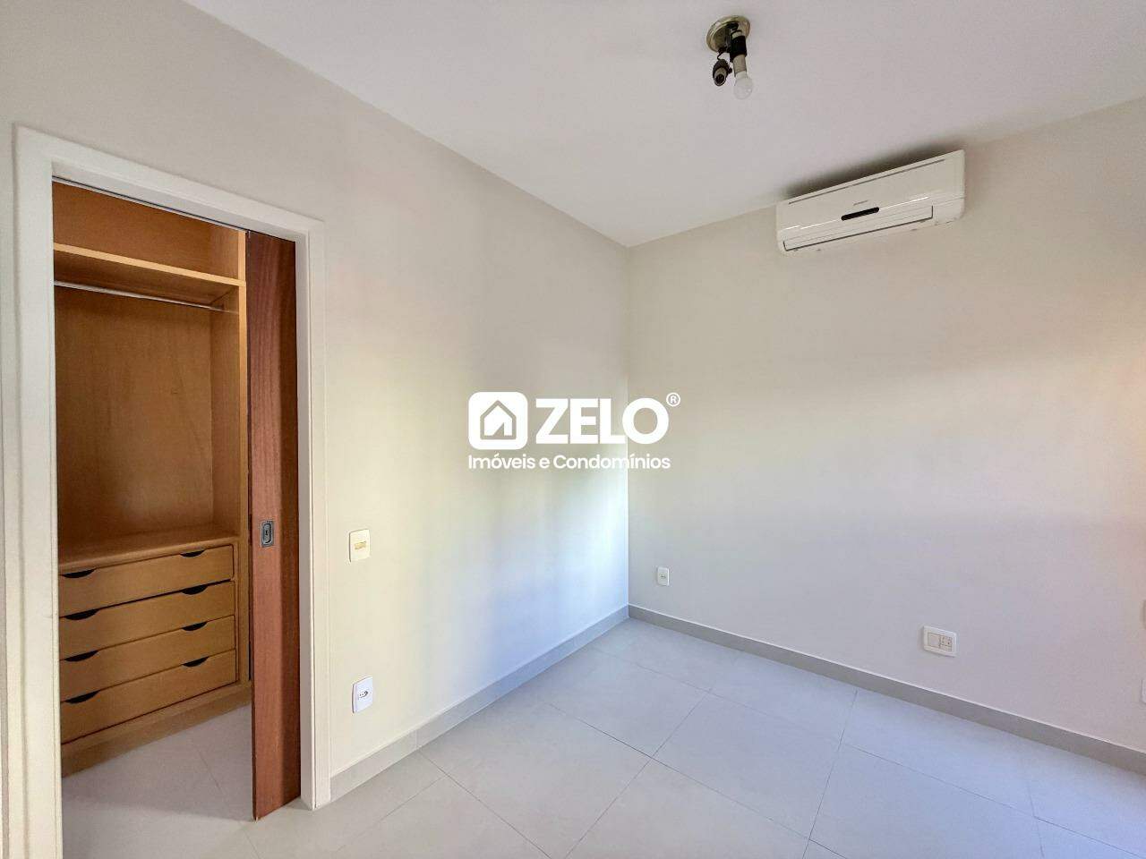 Apartamento em Cambuí, Campinas - SP | Zelo Imóveis: Dormitório com armários