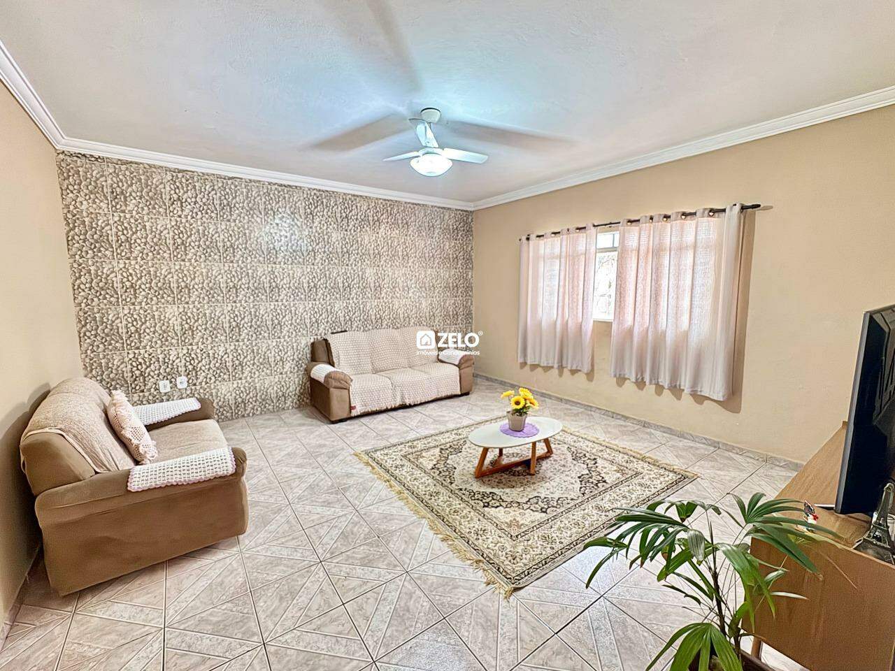 Casa em Jardim Capivari, Campinas - SP | Zelo Imóveis: Sala de estar