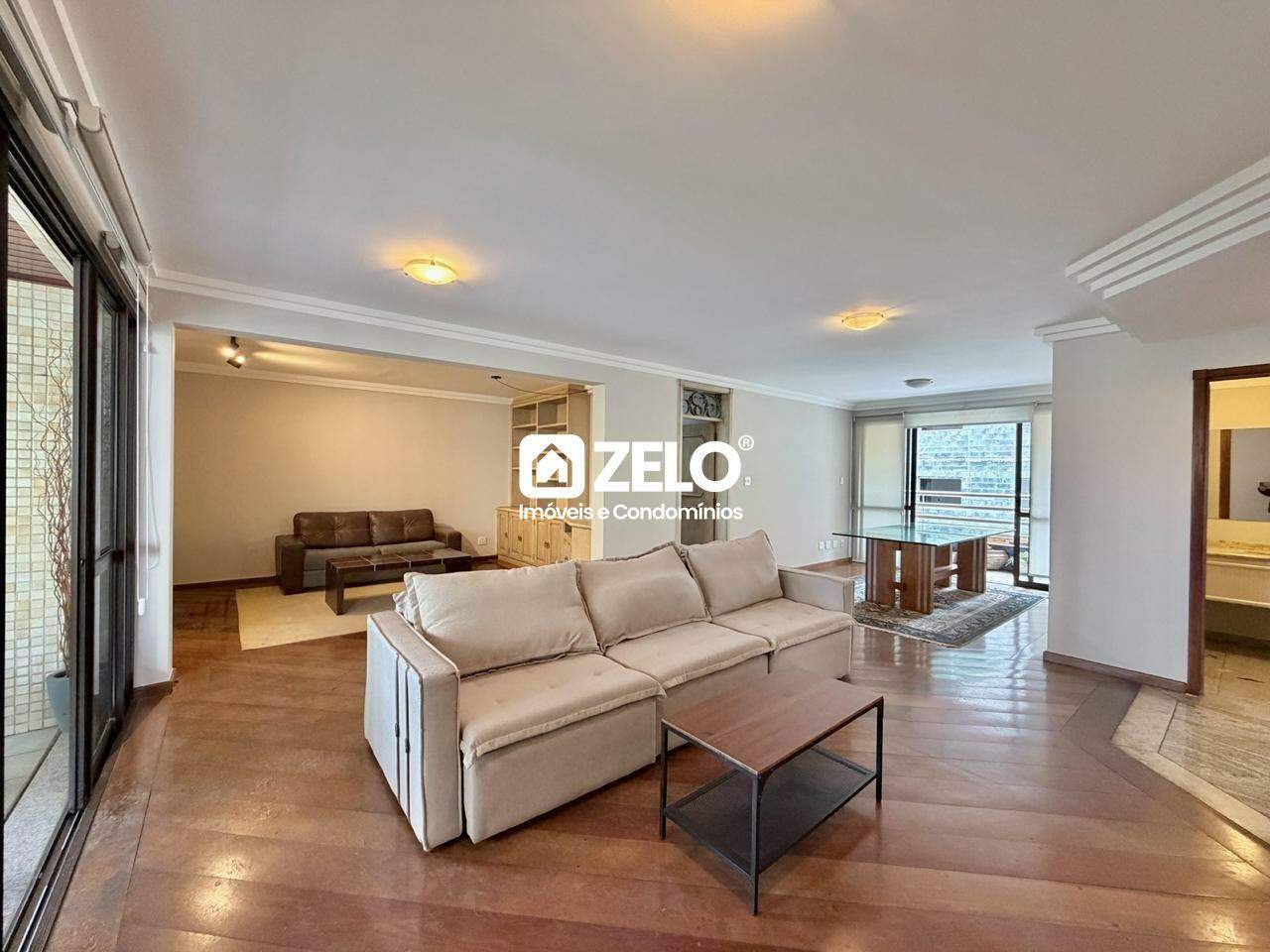 Apartamento em Cambuí, Campinas - SP | Zelo Imóveis: Sala de estar
