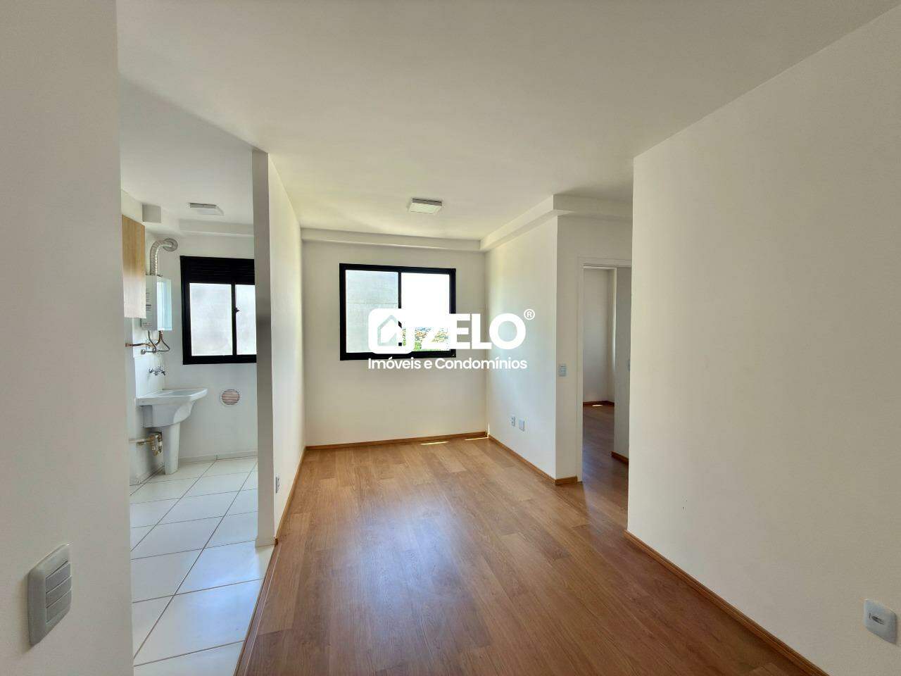 Apartamento em Jardim Ibirapuera, Campinas - SP | Zelo Imóveis: Sala de estar